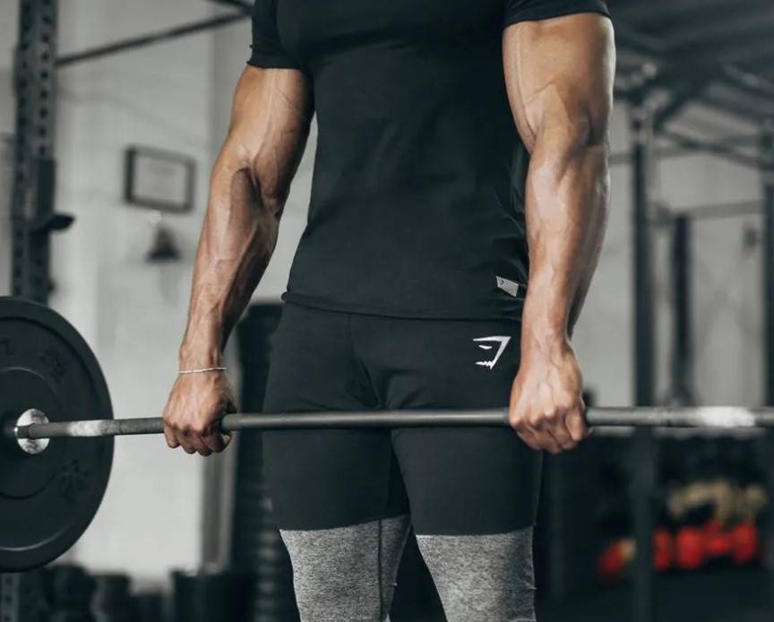 Man working out in Gymshark athletic apparel